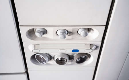 Close up of Light and air conditioner switch control panel on the airplaneの写真素材