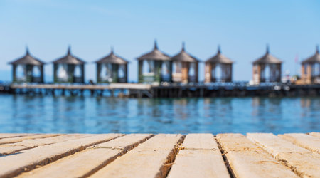 Empty wooden deck on the background of the bungalow.の写真素材