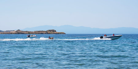 Happy People Enjoy Water Sports. Active rest on the sea.