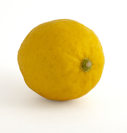 Yellow citrus round shape sour fragrant and delicious lemon on white backgroundの写真素材