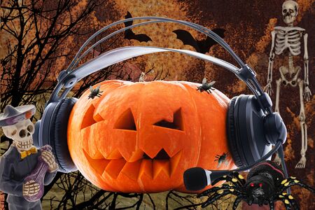 Orange pumpkin for Halloween day with different characters like skeleton centipede spider web bats crows and flies on different backgroundsの写真素材