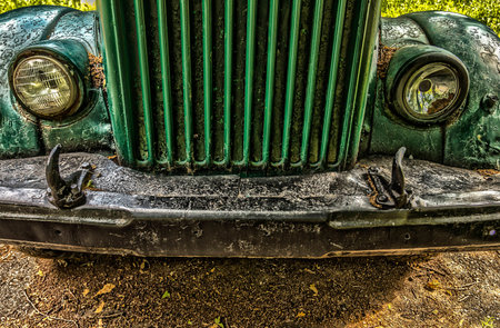 the hood of the truck,old car,classic, style,the front grille of the truck,rusted hoodの写真素材