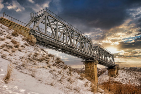 Steel girder railway bridge crossing main west coast line next to Grand Union Canal, London,...