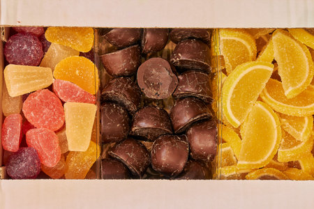 panorama close up a background from colorful sweets of sugar candies and marmalade. assorted candies...