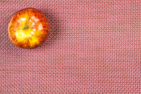 apple on a claret backgroundの写真素材