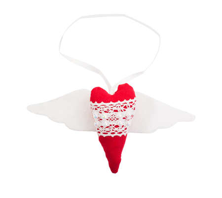 Heart with wings, beads and ribbon isolated on white backgroundの写真素材