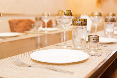 Wine glasses on a table, glasses on a table. Beautiful interior, magnificent table. The buffet tableの写真素材