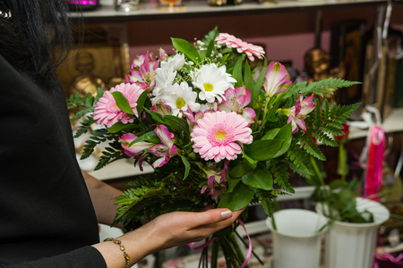 Bouquet of flowers, roses, iris, tulip, chrysanthemum and jewelry fern and needlesの写真素材