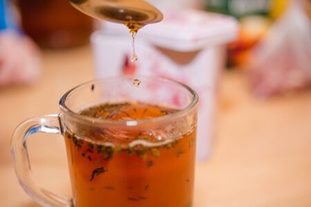 Tea in a bowl. Fresh tea. The invigorating drink. Green tea, Black tea.の写真素材