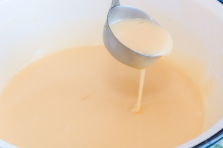 Dough for wafers. Production of dough for wafers. Ingredients for pastries.の写真素材