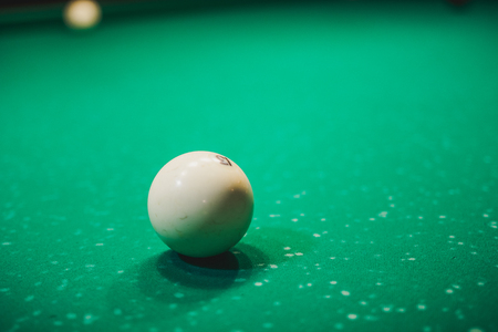 Sphere for playing billiards. Billiard table. Gambling billiards. Entertainment and rest in a pub.の写真素材