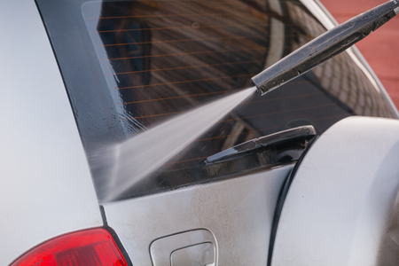 Wash car car wash in the street in autumnの写真素材