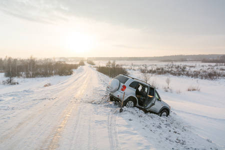 To dig out the car from snow. The car has flown after the journey to snow. The car in snowの写真素材