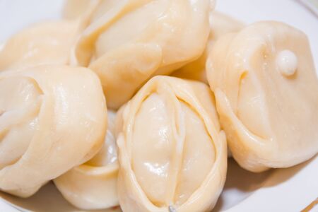 National and traditional Manty dish with a juicy fillingの写真素材