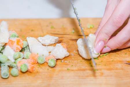 Cut vegetables. Fresh vegetables. Broccoli cabbage. Frozen vegetables. Greens for eating. Natural food.の写真素材