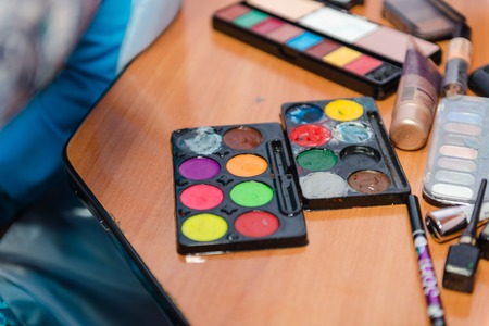 Color makeup. Paints for makeup. Accessories for applying makeup on a clown. Makeup.の写真素材