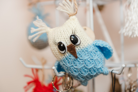 Knitted children's toys. Hand-made toys as a gift. Designer fun stuff. Homemade creativity. Hobbies and hobbiesの写真素材