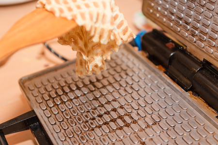 Bake waffles. Home cooking. Cooking waffles at home. Natural food. Cookingの写真素材