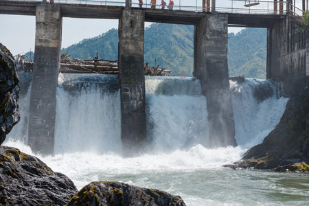 hydroelectric power station. the flow of water. energy production. hydroelectric power station in...