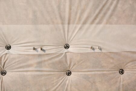 insulation of the facade of the house. wind protection of the facade of the house. wind protection at home. waterproofing the house. facade repair. home constructionの写真素材