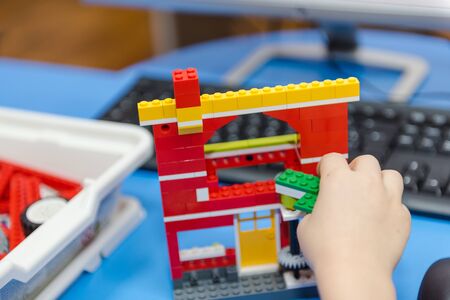 children collect robots from the designer. the children's designer. classes in robotics. children's entertainmentの写真素材