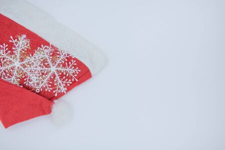 Christmas background. Santa Claus hat on a white background. Red Hatの写真素材