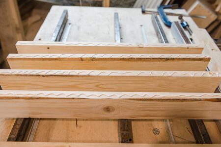 apply glue to the tree. glue the wooden board. glue the wood worktop. joinery.の写真素材