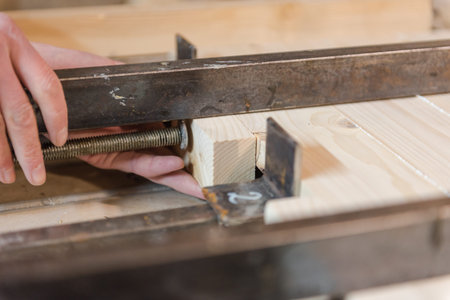 clamping clamps for wood. glue the wooden shield. joinery.