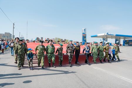 Zarinsk, Russia - May 9, 2019: Procession of the immortal regiment on Victory Day. The parade of people on May 9th. Victory Dayのeditorial素材