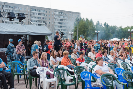 Zarinsk, Russia - July 22, 2019: A huge crowd of people stands on the square. Crowdのeditorial素材