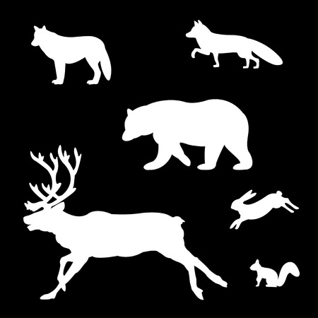 Set of silhouettes of wild animals on a white background.のイラスト素材