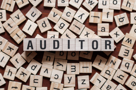 Auditor word on building block conceptの写真素材