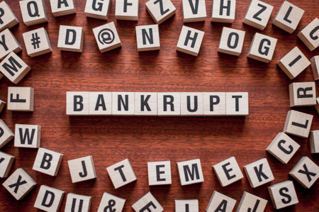 BANKRUPT word concept on cubes.の写真素材