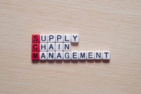 Supply chain management - word concept on cubes, text, lettersの写真素材