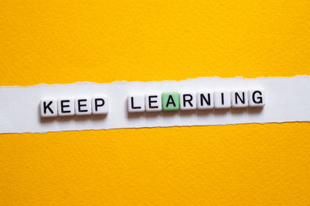 Keep learning - word concept on cubes, text, lettersの写真素材