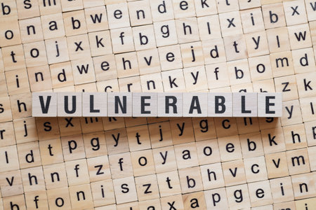 Vulnerable - word concept on cubes, text, lettersの写真素材