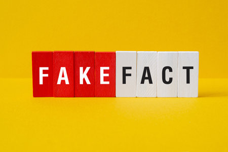 Fake fact - word concept on building blocks, textの写真素材