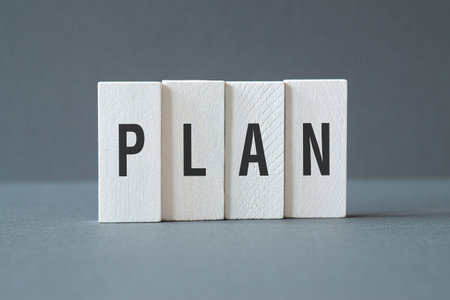 Plan - word concept on building blocks, text, letters