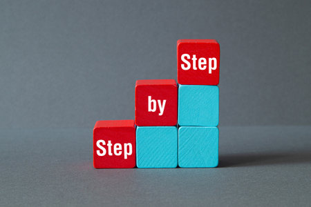 Step by step - word concept on building blocks, text, lettersの写真素材