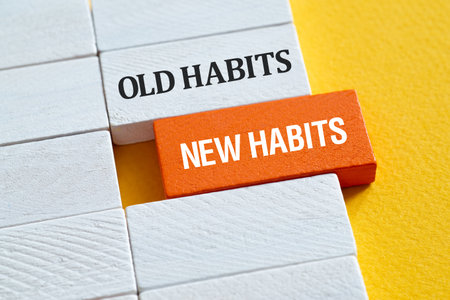 Old Habits , New habits - word concept on building blocks, text, lettersの写真素材