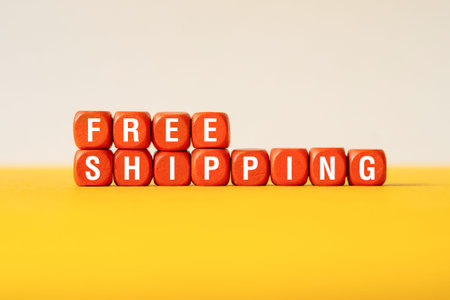 Free shipping - word concept on building blocks, text