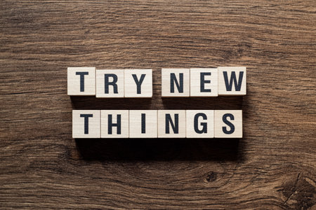 Try new things - word concept on building blocks, textの写真素材