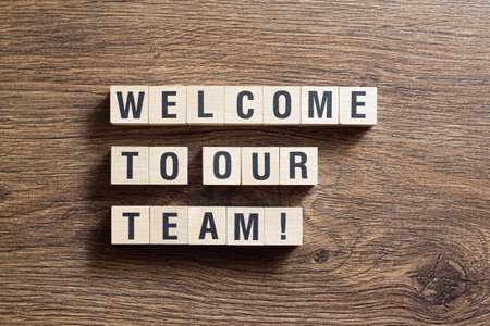 Welcome to our team - word concept on building blocks, textの写真素材