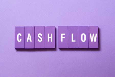 Cash flow - word concept on building blocks, textの写真素材