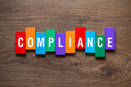 Compliance - word concept on building blocks, textの写真素材