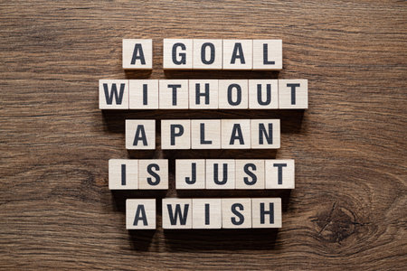 A goal without a plan is just a wish - word concept on building blocks, text