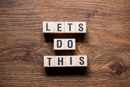 Lets do this - word concept on building blocks, text