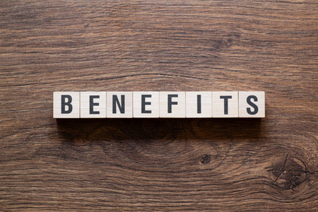 Benefits - word concept on building blocks, text