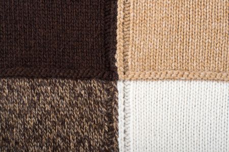 Knitted textile from four beige, white, brown and speckled brown patterns Backgrounds Abstract の写真素材