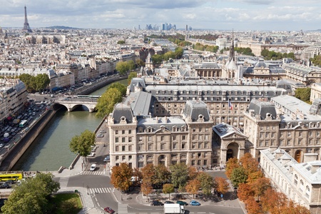 Top view from cathedral Notre Dame on river Seine, bridge Saint Michel and Neuf, roofs, housetops, streets, center, downtown, tower Eiffel in Paris France in autumnの写真素材